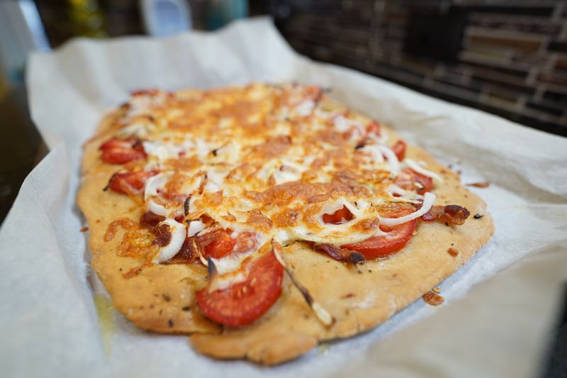 Fig and gorgonzola gourmet pizza with caramelized onions